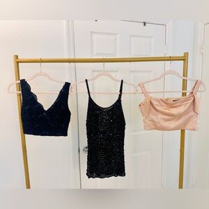 3 tops for price of one.Navy and black sequin top also champagne crop satin top